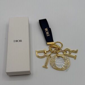 DIOR GOLD AND NAVY KEY CHAIN BAG CHARM